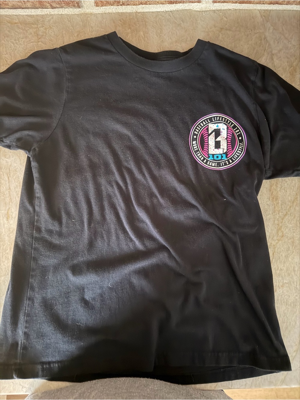 Baseball Lifestyle 101 Black Short-Sleeve Tee with Pink & Blue Chest Emblem